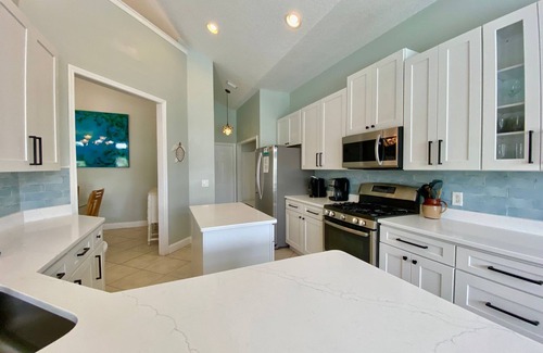 Butler Beach House | Villa Elena - Elegant Spacious House by the Beach with Large Pool & Heated Spa!