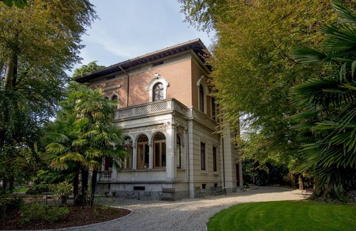 Mandello del Lario Villa | Villa in pure Art Nouveau style with swimming pool and park