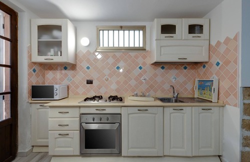 Capo Mannu Apartment | Villa "Agostina Antonio" with Shared Garden and Wi-Fi