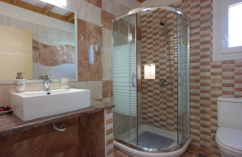 Afionas Villa | Villa Kamini, A Superb Seafront Villa - just steps from the glorious beach!