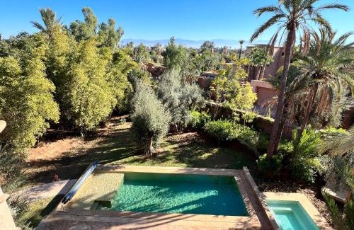 Annakhil Villa | Villa kasbah de luxe, piscine et jacuzzi chauffés, jardin tropical