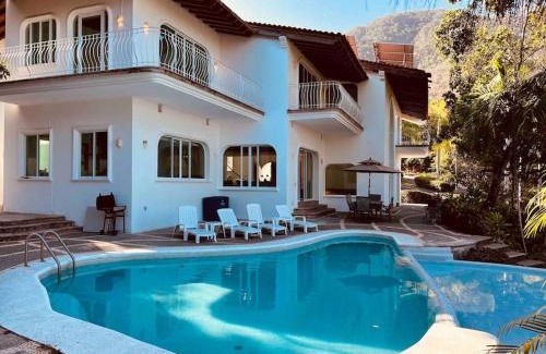 South Shore Hotel Area Villa | Villa Martha Garza Blanca - Heated Pool, Chef & Full Staff Included
