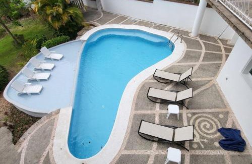 South Shore Hotel Area Villa | Villa Martha Garza Blanca - Heated Pool, Chef & Full Staff Included