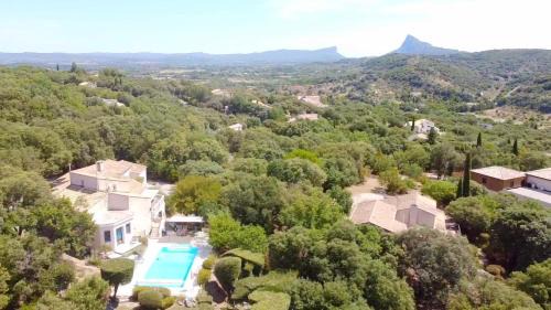 Saint-Martin-de-Londres Villa | Villa Mas de Bouis - Views, Heated Pool, XL 6 Bedroom, AC, Nature, Beauty & Boules!