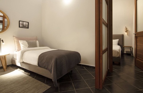 Kerameikos Villa | VILLA MELITI: Indoor pool, down town