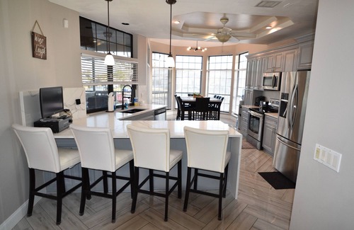 Apollo Beach House | Villa Oasis, w/Heated & Covered Pool, Pool Table, Boat Dock, Gym and much more.