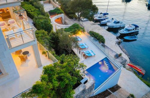 Bobovisca Villa | VILLA PHILIPPA - luxurious five-room villa - idyllic location - first row to the sea - spectacular view of the sea bay - unforgettable sunsets - 15 minutes from Supetar ferry port - free parking - private pool