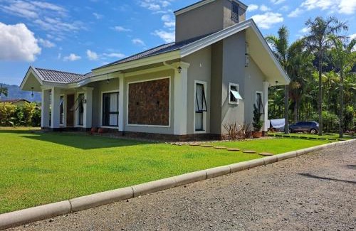 Pomerode House | Villa Pomerode Hospedagem - Suítes