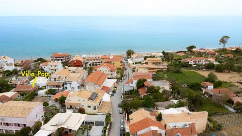 Agios Gordios House | Villa Popi on the beach of Agios Gordios