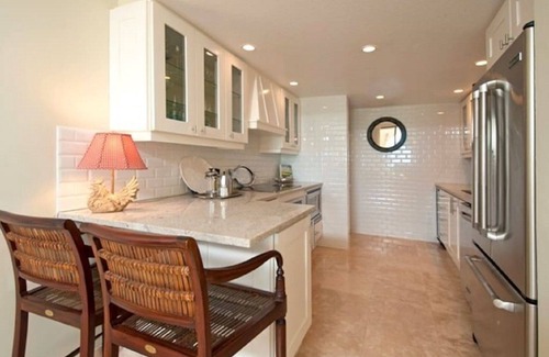 West Bay Condo | Villa Steps From The Sand