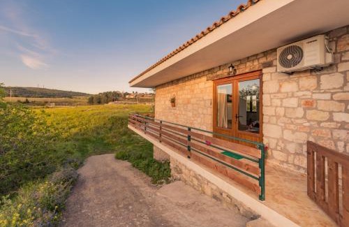 Elation House | Villa windmill Near Shipwreck Beach by "elite"