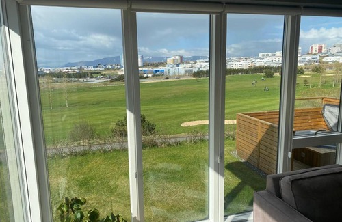 Kopavogur Apartment | Villa with a view (golf course), hot tub and gym