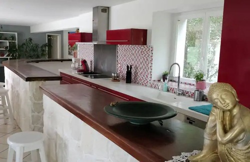 Vaudreuille Villa | Villa 'Zen Et Tropicale' with Mountain View, Shared Pool and Wi-Fi