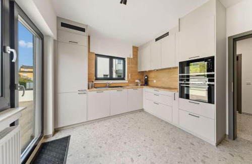 Roeser Apartment | Villa66 Private Bedroom 4 - Shared Kitchen