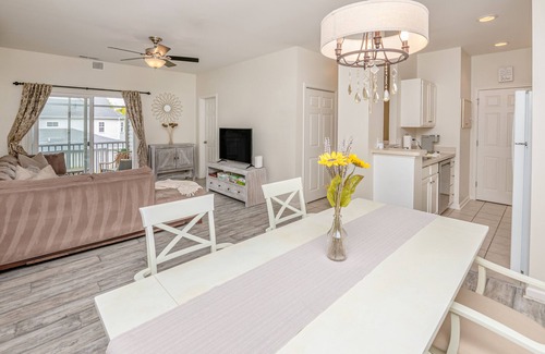 Rehoboth Beach Condo | Villas at Bay Crossing dog-friendly condo with pool, balcony, water views, & W/D