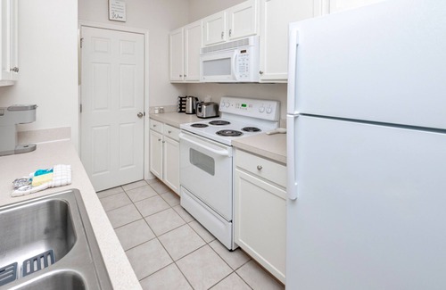 Rehoboth Beach Condo | Villas at Bay Crossing dog-friendly condo with pool, balcony, water views, & W/D