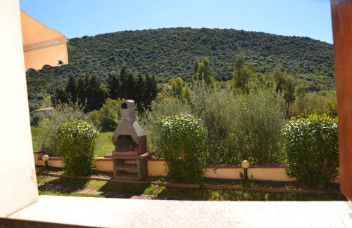 Agrustos Apartment | Villetta con giardino in contesto riservato non lontana dal mare BEL01