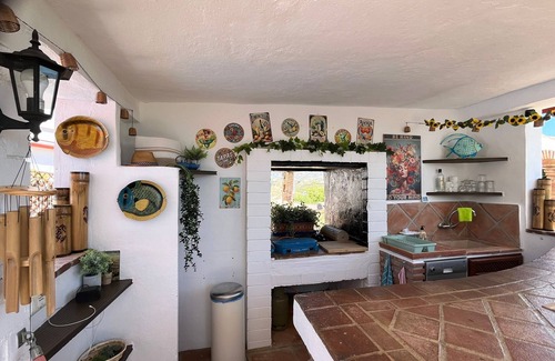 Benamocarra Apartment | Viñuela Hideaway - Your Mountain Studio with Kitchen & Pool