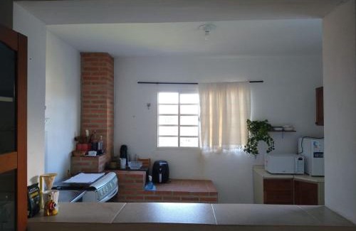 Cunha Apartment | Vista das serras