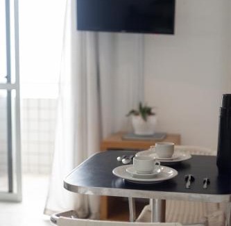 Ponta do Farol Apartment | Vista Mar e Lagoa - Cozinha e Frigobar - Apartamento Flat Próximo à Praia