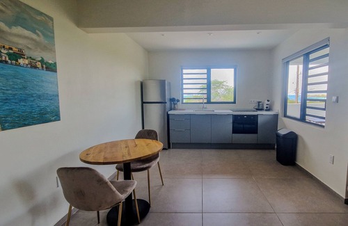 Sabana Westpunt Apartment | Vista Papaya Cozy 1-bedroom apartment in gorgeous Sabana Westpunt with WiFi, AC