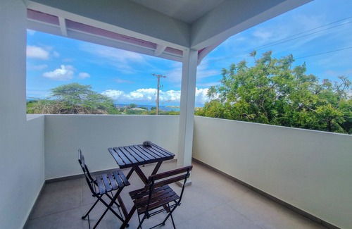Sabana Westpunt Apartment | Vista Papaya Cozy 1-bedroom apartment in gorgeous Sabana Westpunt with WiFi, AC