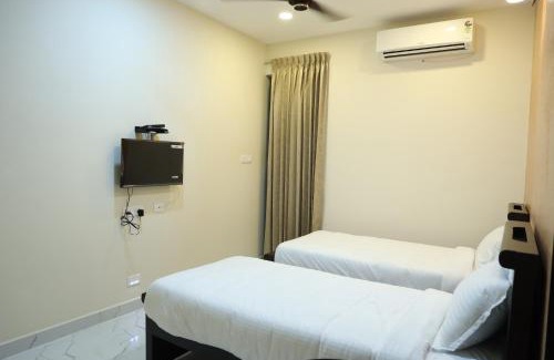 Kelambakkam Hotel | VR PARADISE Inn