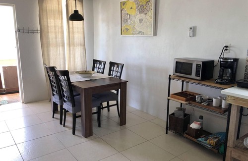 Providenciales Apartment | Wake up to Pelicans cruising the beach!