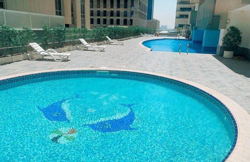 Dubai Apartment | Wake Up To Sea Views In A Blue Lush Home On 51st