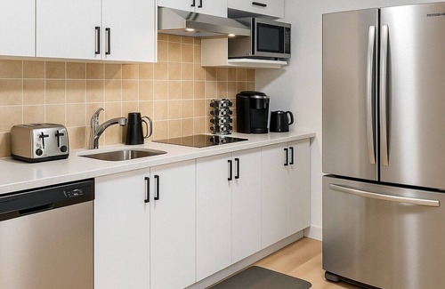 Airdrie Apartment | Walk-Out Comfort