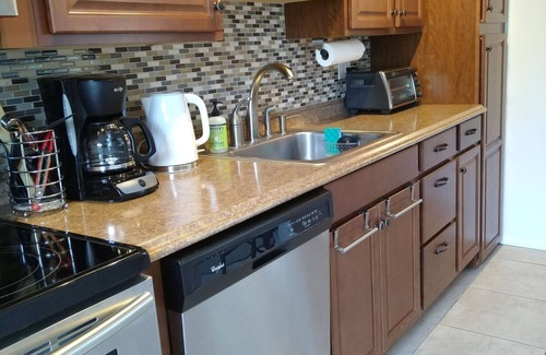 Whitney Beach House | Walk to beach & nature park! Canal front, bright & breezy townhome!