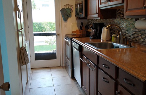 Whitney Beach House | Walk to beach & nature park! Canal front, bright & breezy townhome!
