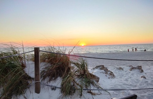 Whitney Beach House | Walk to beach & nature park! Canal front, bright & breezy townhome!
