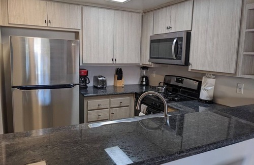 Hermosa Village Condo | Walk to Disney, hot tub, strollers! One Parking Spot