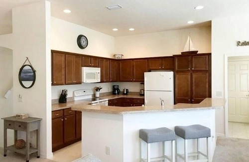 Lake Sumter Landing House | Walk To Lake Sumter Landing From This Amazing Villa w/Bikes, WiFi, Golf Cart!