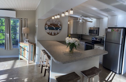 Marco Island House | Walk to Marco's beautiful white sand beach or lounge by your private pool.