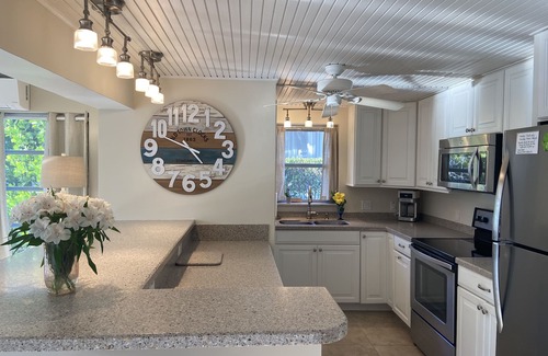 Marco Island House | Walk to Marco's beautiful white sand beach or lounge by your private pool.