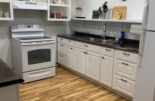 Bear Creek Apartment | Walk to see salmon in Bear Creek. The entire bottom floor is your apartment.
