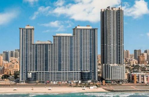 Rumailah Apartment | Walk to the Beach, Charming 3-Bedroom Home in Ajman Corniche Residences