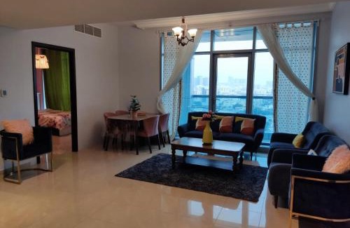 Rumailah Apartment | Walk to the Beach, Charming 3-Bedroom Home in Ajman Corniche Residences