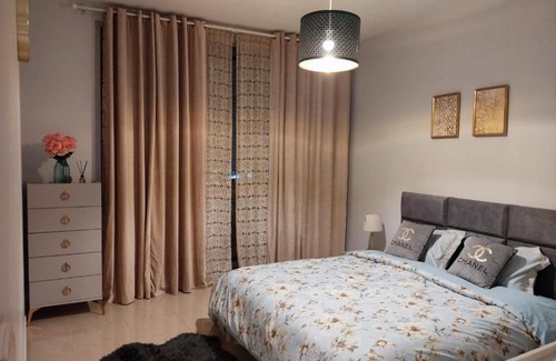Rumailah Apartment | Walk to the Beach, Charming 3-Bedroom Home in Ajman Corniche Residences