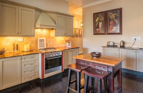 Green Point House | Walk to the Beach from a Cape Dutch Heritage Bungalow