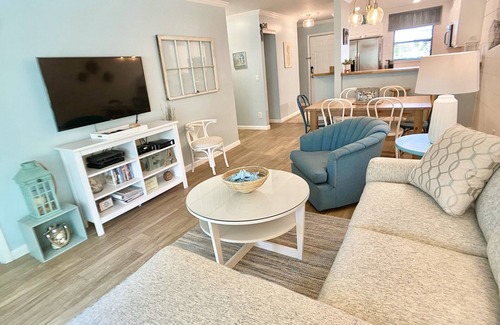 Hilton Head Island Villa | Walk to the beach ~ Relaxing Enclosed Porch ~ Close to Coligny ~ 3 onsite pools
