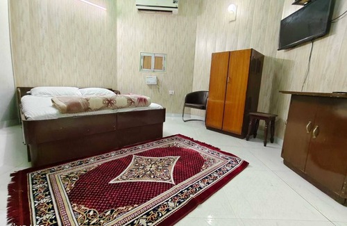 Jaipur District Resort | Walking distance jaipur international airport terminal2 big garden area room.