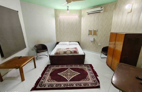 Jaipur District Resort | Walking distance jaipur international airport terminal2 big garden area room.