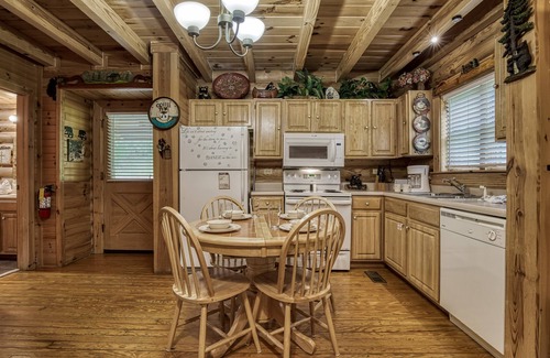 Gatlinburg - Pigeon Forge Cabin | Walking distance to river and outdoor pool access Free Internet Access sleeps 7 Hot tub and more