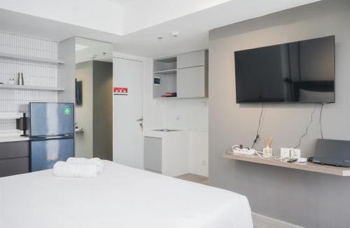 South Tangerang Apartment | Warm and Simply Studio Room at Urbantown Serpong Apartment By Travelio