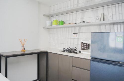 South Tangerang Apartment | Warm and Simply Studio Room at Urbantown Serpong Apartment By Travelio
