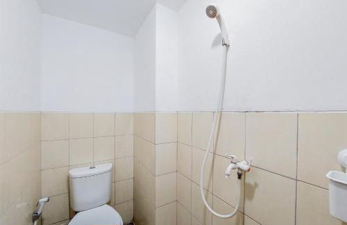 South Tangerang Apartment | Warm and Simply Studio Room at Urbantown Serpong Apartment By Travelio