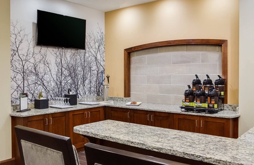 Historic East Village Condo | Warm and Welcoming Suite | Free Breakfast, Indoor Pool + Hot Tub